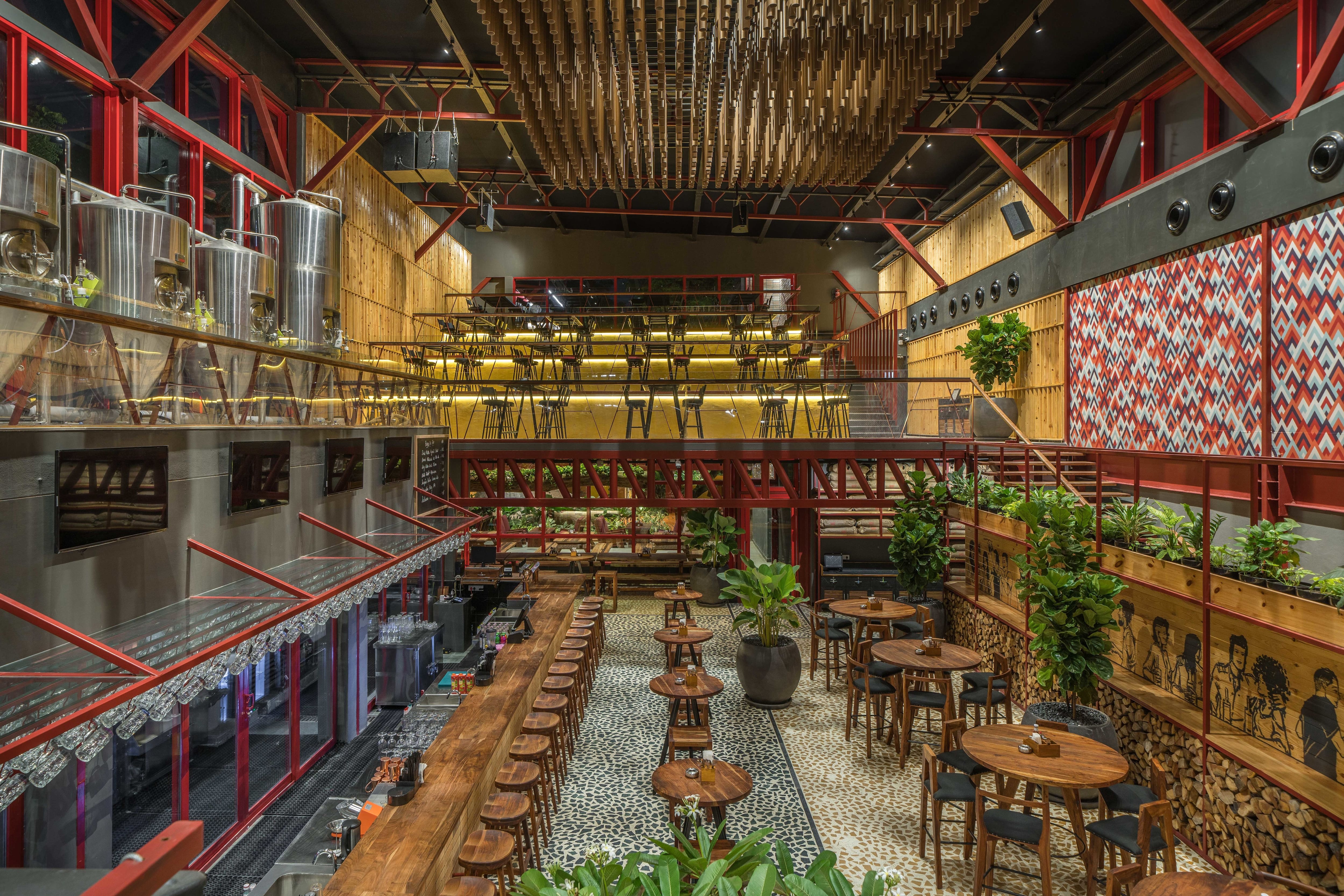 Evening inside Broadway The Brewery — vintage decor under warm hanging lamps